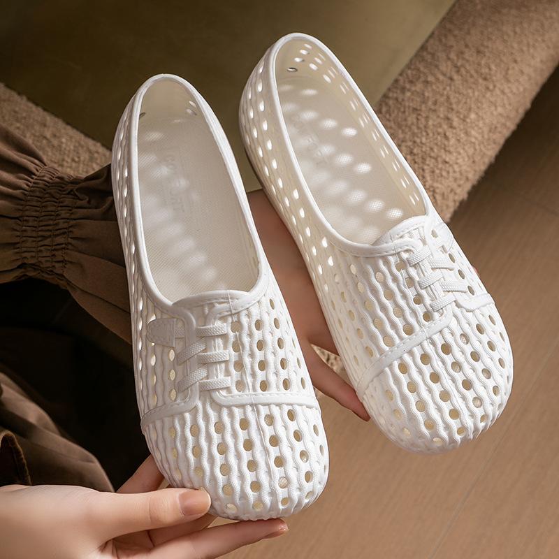 Suvised õõnes mustriga hingavad paksu tallaga sandaalid naistele ja pehme tallaga vabaaja rannaplätud naistele