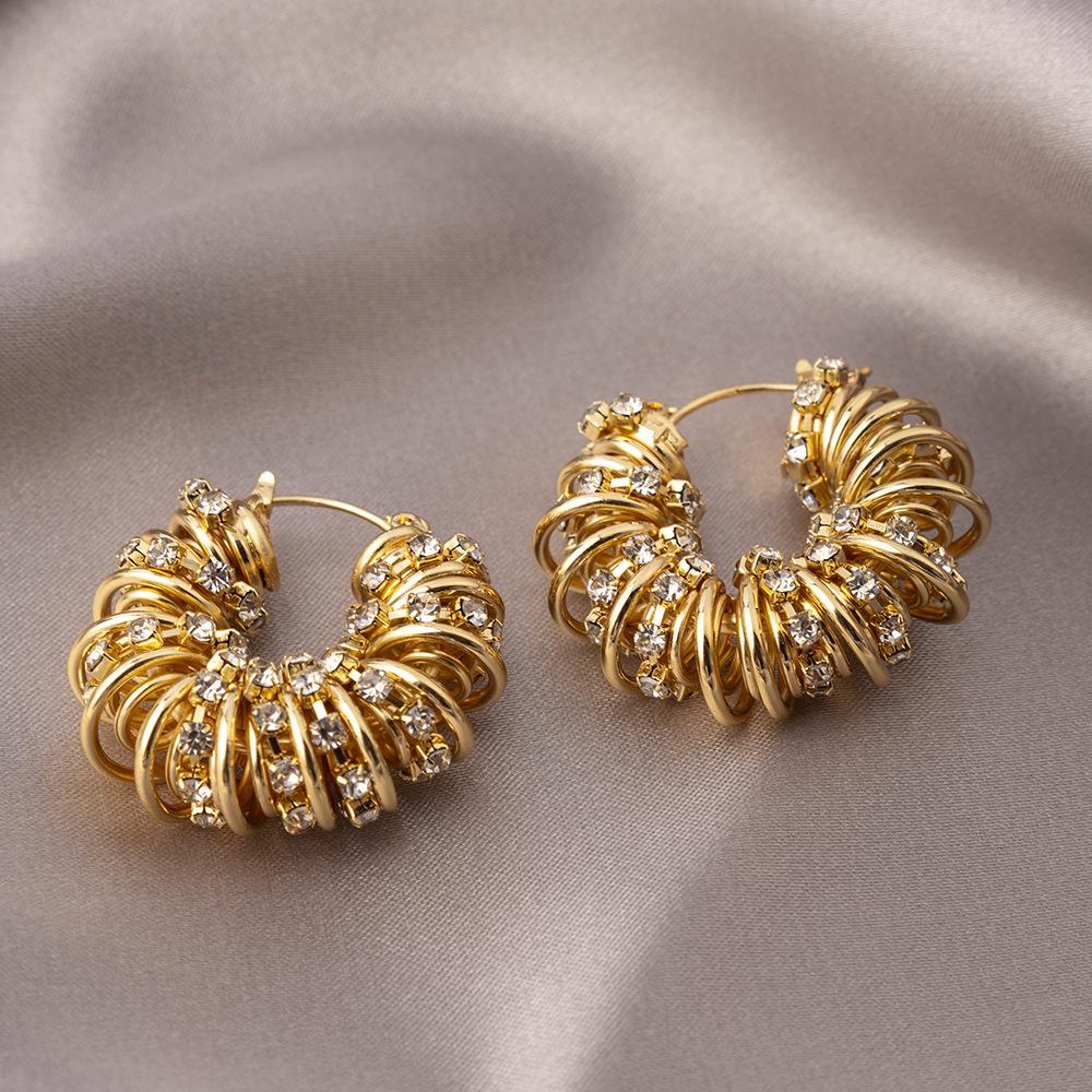 Evropské a americké spirálové náušnice s diamanty: Luxusní, špičkové kruhové náušnice s trendy, niche chladným stylem