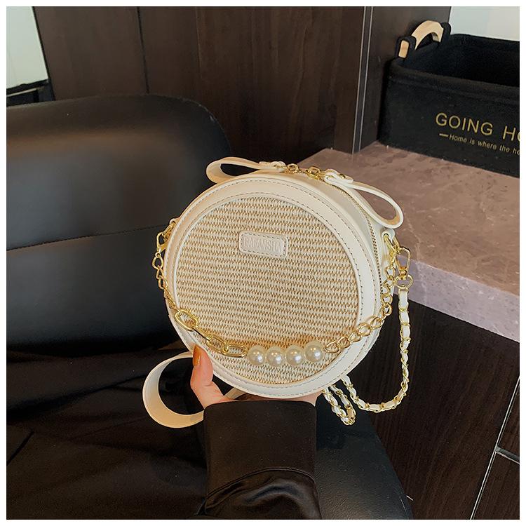 

Нишевая мода вышитая маленькая сумка женская простая универсальная маленькая круглая сумка 2025 новая летняя повседневная сумка-мессенджер