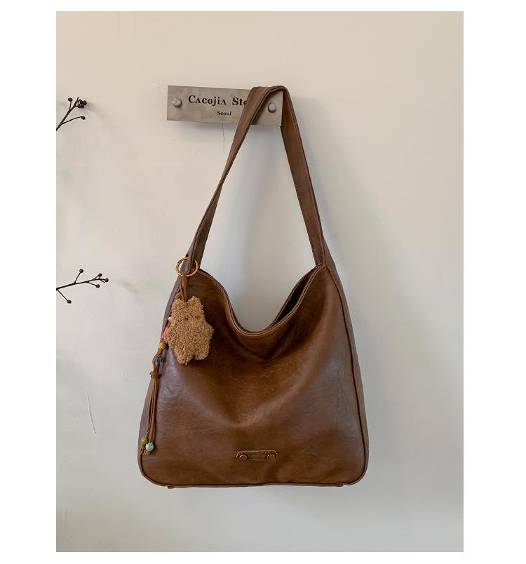 

Retro large-capacity bag women s 2025 new fashion super fire tote bag high-end commuter underarm shoulder bag tide коричневый