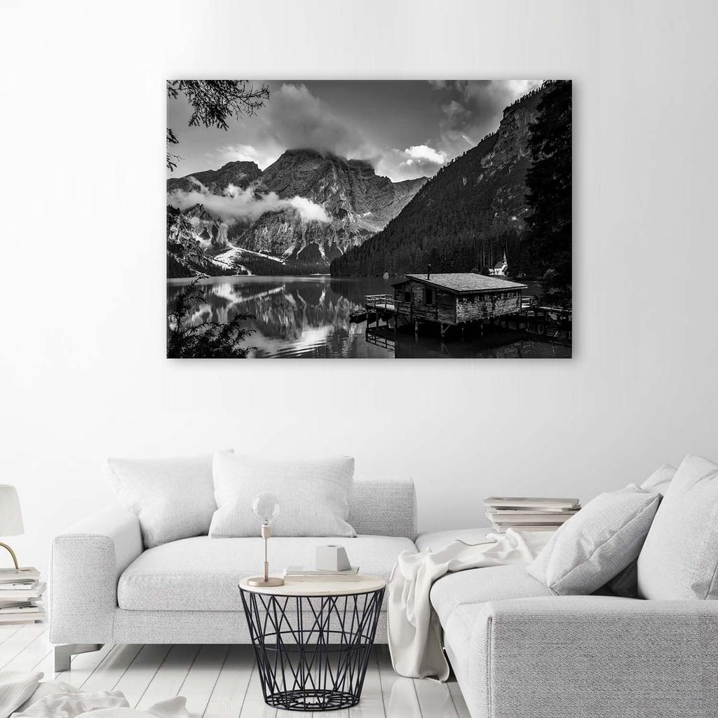 Canvas print Hut at a mountain lake Alps