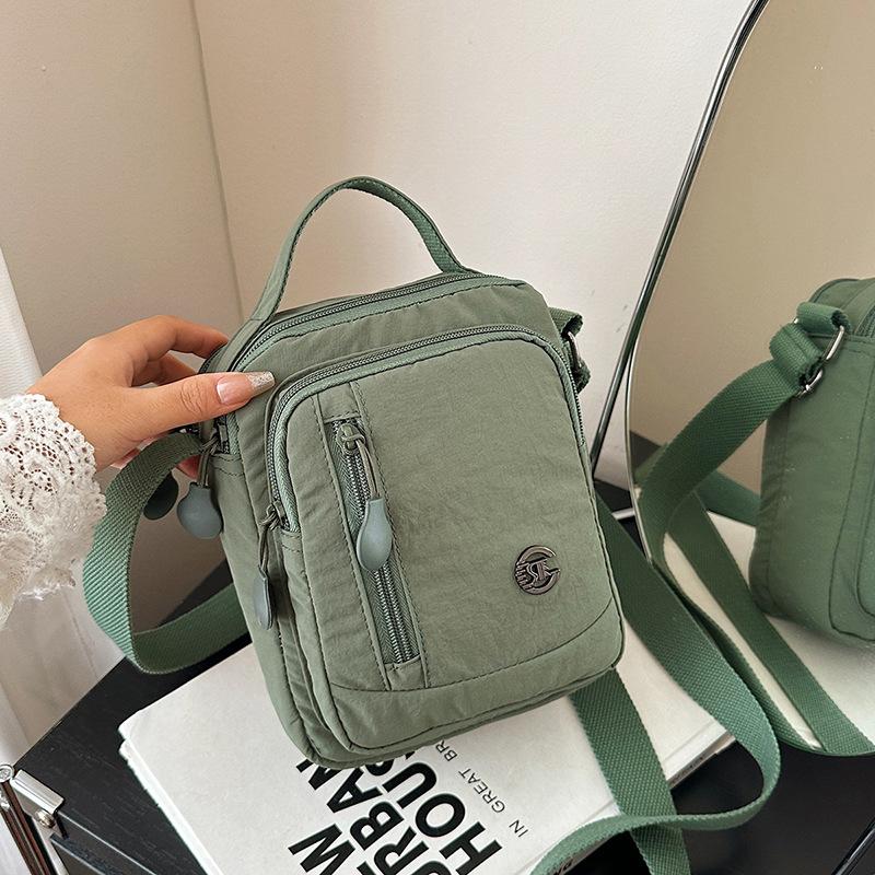 

Niche versatile lightweight small cloth bag women s new outdoor leisure handbag shoulder messenger mobile phone bag зелёный