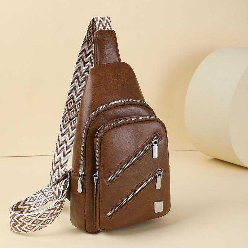 New fashionable and versatile women's breast bag, mobile phone bag, shoulder bag, large-capacity travel and leisure oblique span bag.