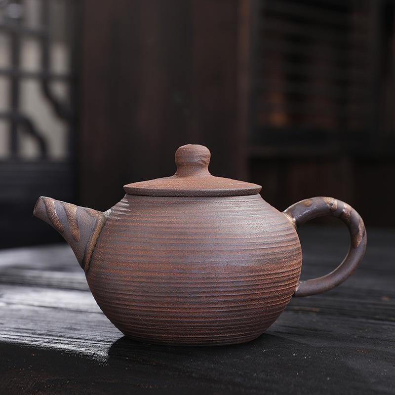 Stoneware teapot gilt iron glaze ceramic filter household teapot old rock mud pot kung fu tea set tea separation