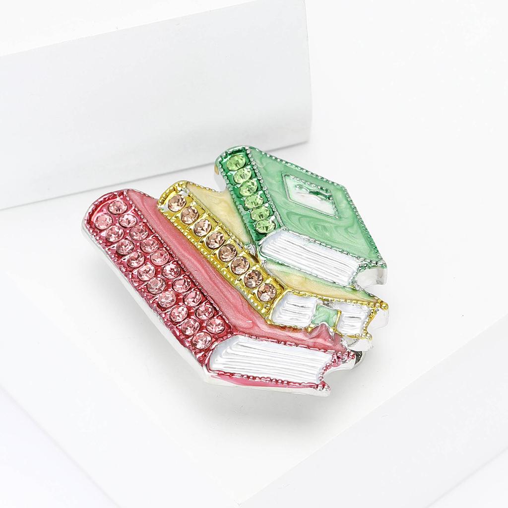 Emalje Rhinestone Tre bøker Modelleringsbrosje Kreativ Herre- og Dameklær Corsage Smykker Pin Nå