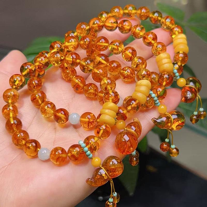 Bracelet unisexe en perles d'ambre ethnique: Design Floral, Perles Rondes en Cire d'Abeille