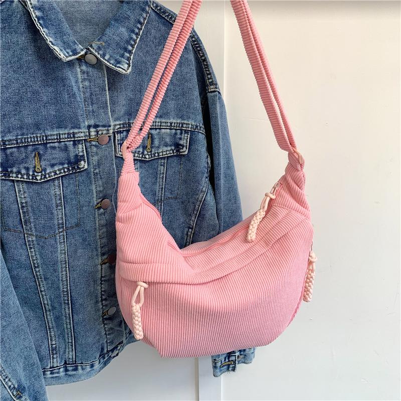 Spring new simple large-capacity messenger bag female student small satchel sports versatile backpack dumpling bag