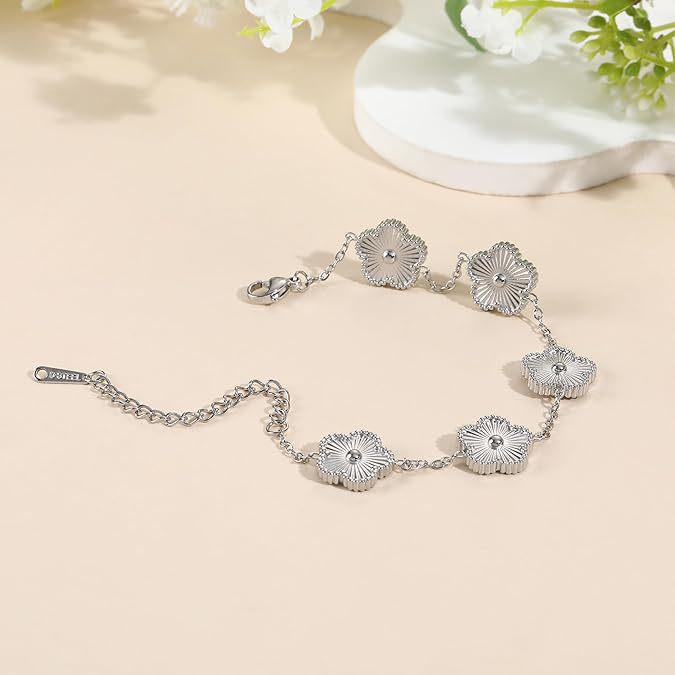 

Стильный браслет из титановой стали с цветком из пяти лепестков и четырехлистным клевером