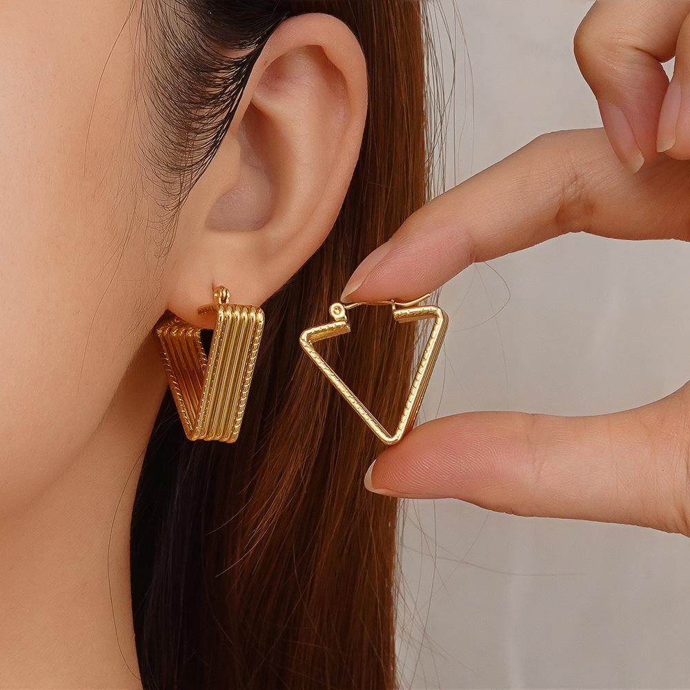 IMI Titanium Steel Twisted Line Hoop Earrings - Light Luxury Geometric Design
