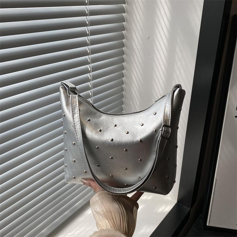 Stylish and simple rivet underarm bag women's new versatile dumpling bag high-end retro messenger bag