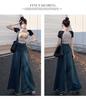 Plus Size Retro Frayed Wide-Leg Denim Skirt for Pear-Shaped Women - High Waist, Slimming Flared Design for Spring and Autumn.