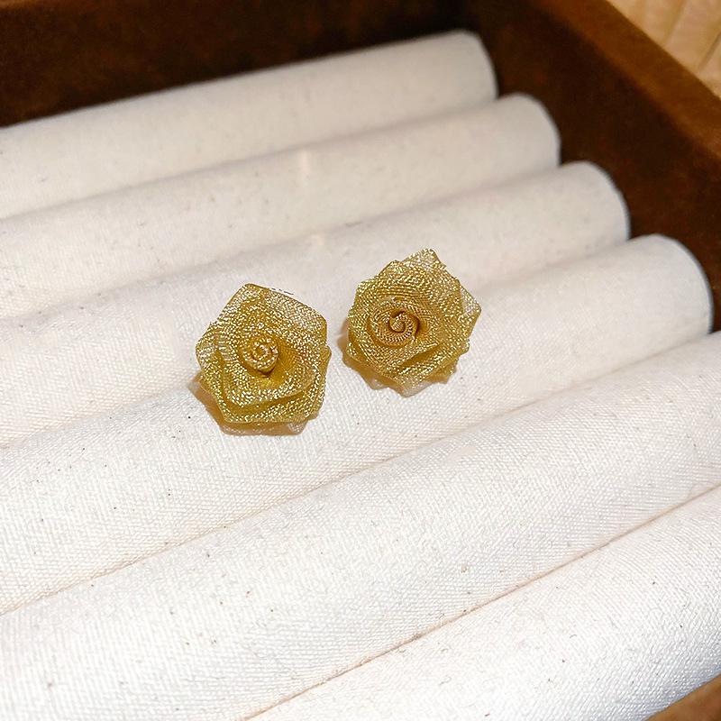 Name: "Retro Metallic Woven Flower Silver Stud Earrings"