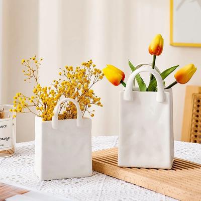 Nordic Creative Shopping Basket Ceramic Mini Vase Bag Decoration Simple Dried Flower Arrangement Vases Table Decor Mini Pots Art