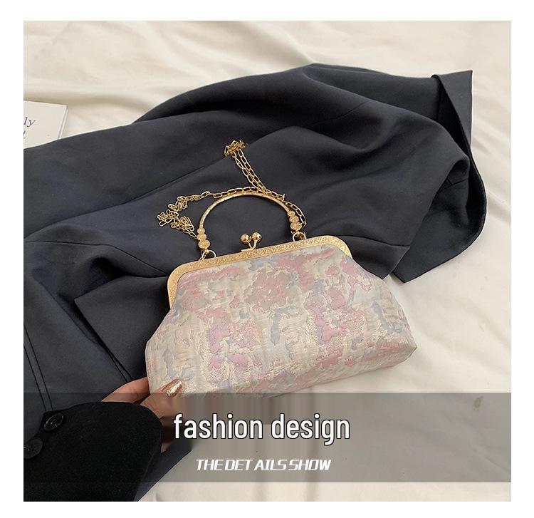 Elegante bestickte Umhängetasche mit Kettenverschluss