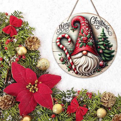 Vánoční dřevěná závěsná cedulka s designem Santovy hůlky