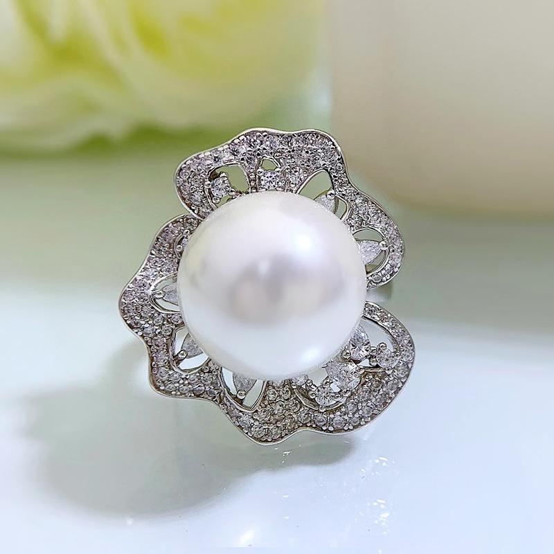 

Longlongjin Элегантное женское кольцо из 14-мм ракушечного жемчуга, серебро S925 Size 5