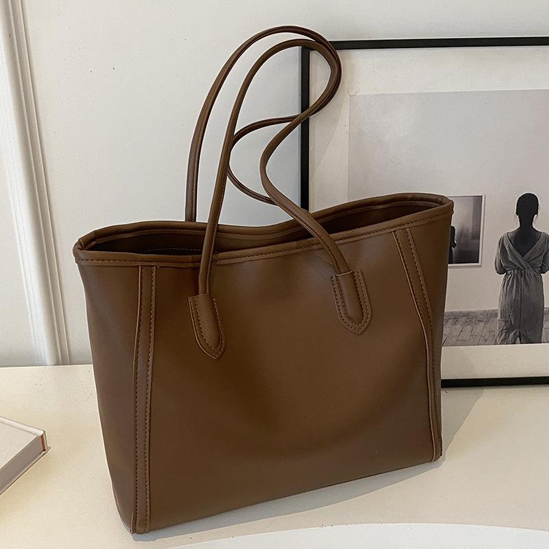 

Wholesale casual Korean version simple contrasting color underarm tote bag women s fashion temperament large capacity texture shoulder bag