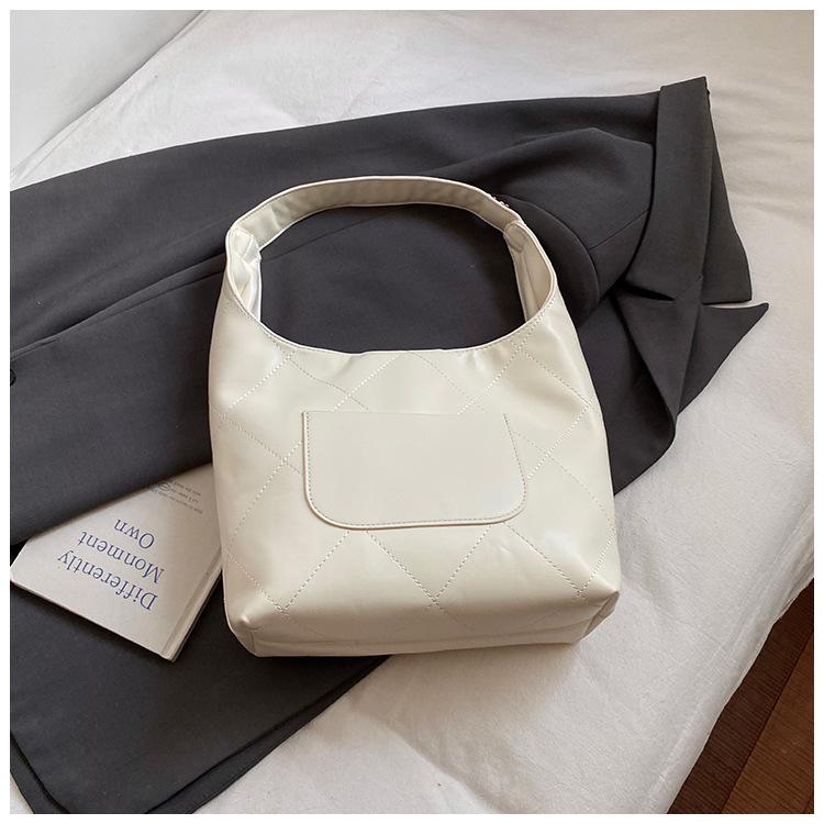 

Fashion large-capacity bag women s 2025 new commuter versatile underarm bag premium texture shoulder bag білий