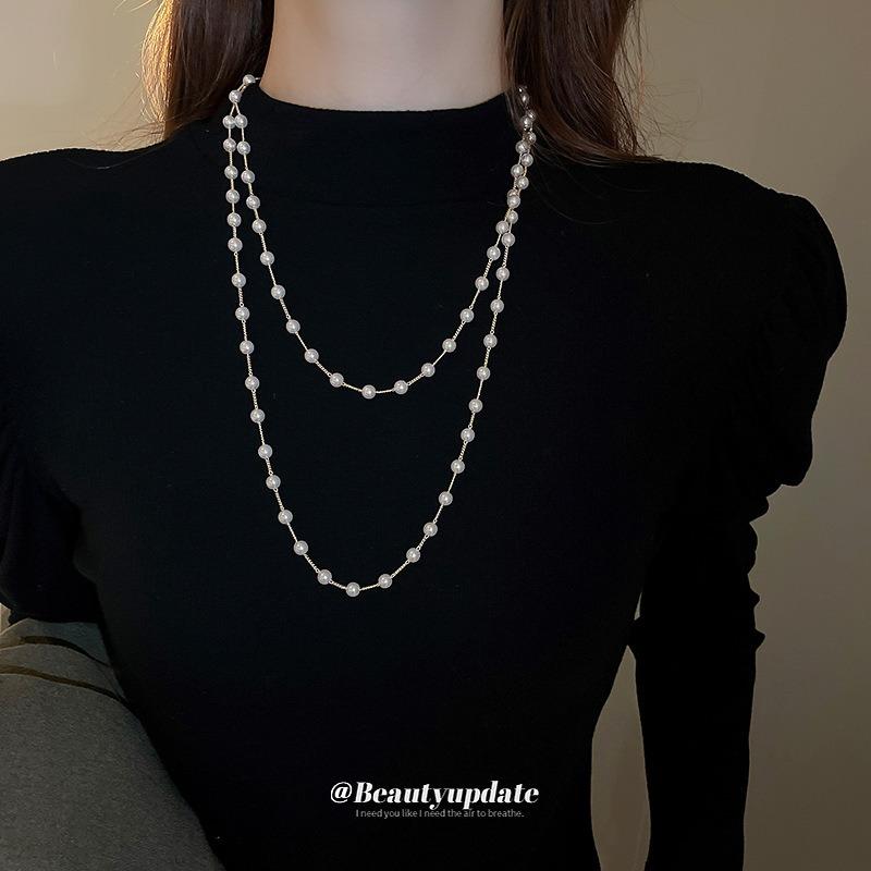 Artificial pearl beaded stacked necklace women's French retro autumn and winter sweater chain light luxury high-end dignified jewelry