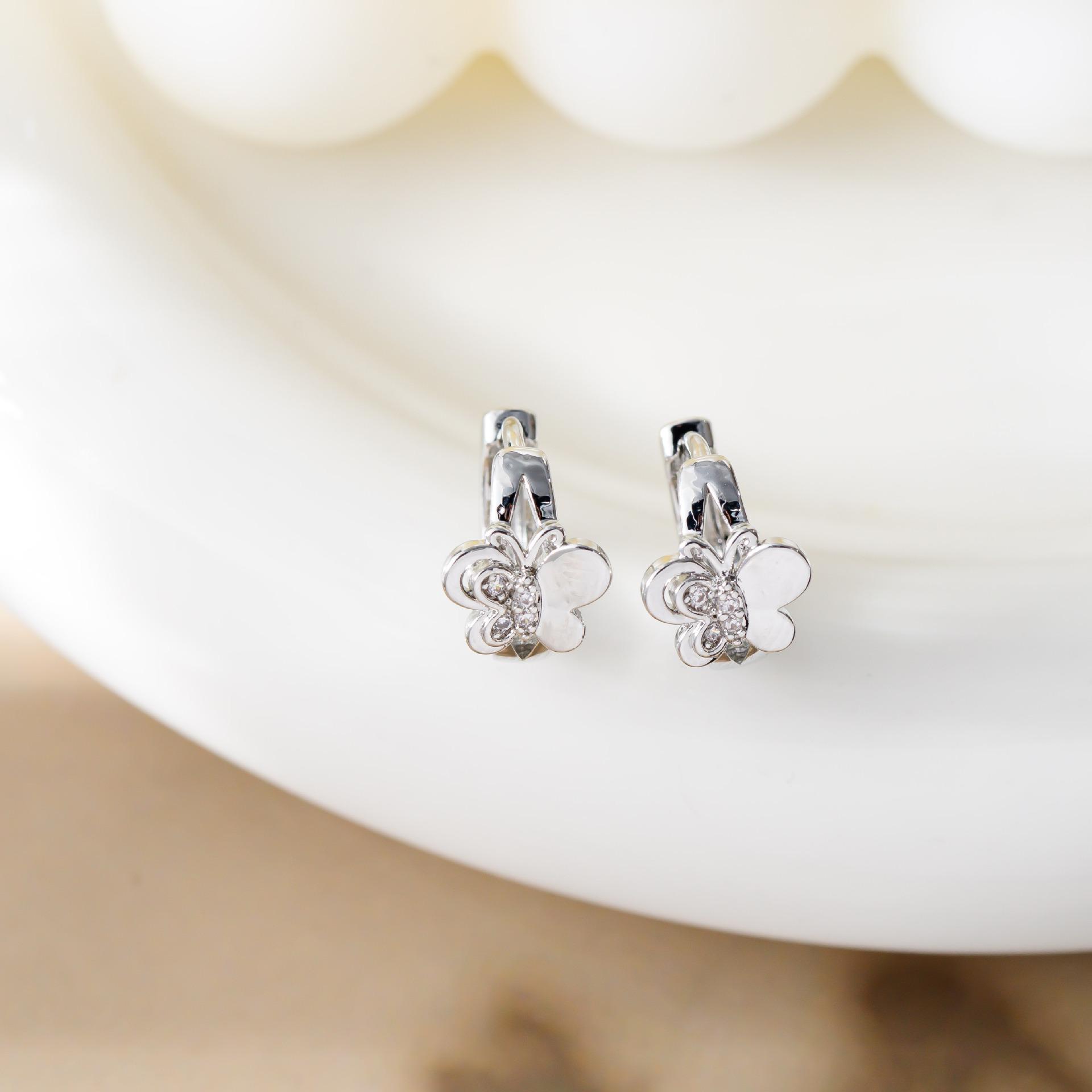Creative Micro-Inlaid Hollow Butterfly Stud Earrings: Women s Fashion Accessory