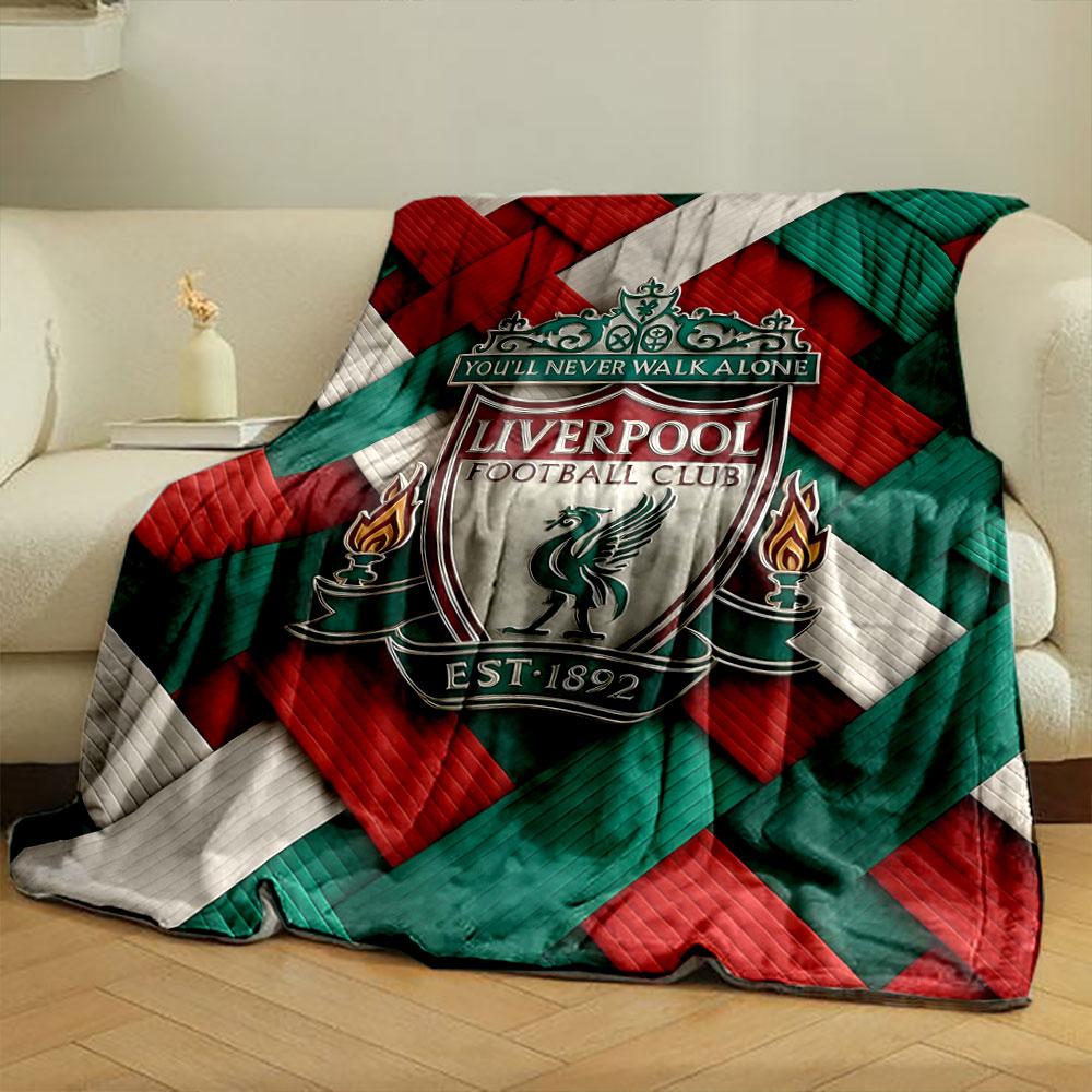 Woven red, green, and white textured pattern with a central crest. for all seasons blanket lunch break throw gift