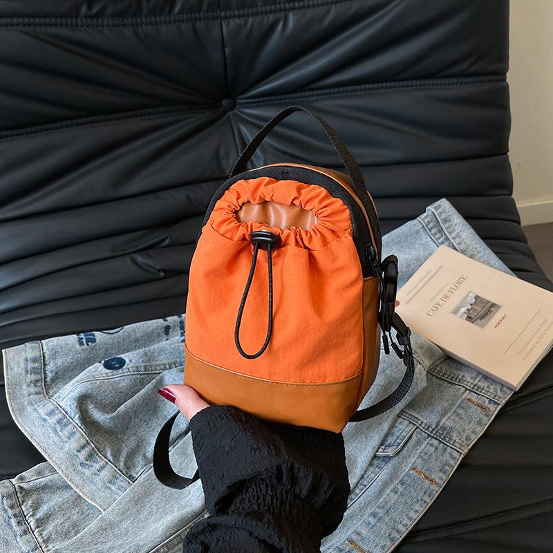 Niche sports messenger bag casual small bag street men and women simple 2025 spring trend shoulder bucket bag