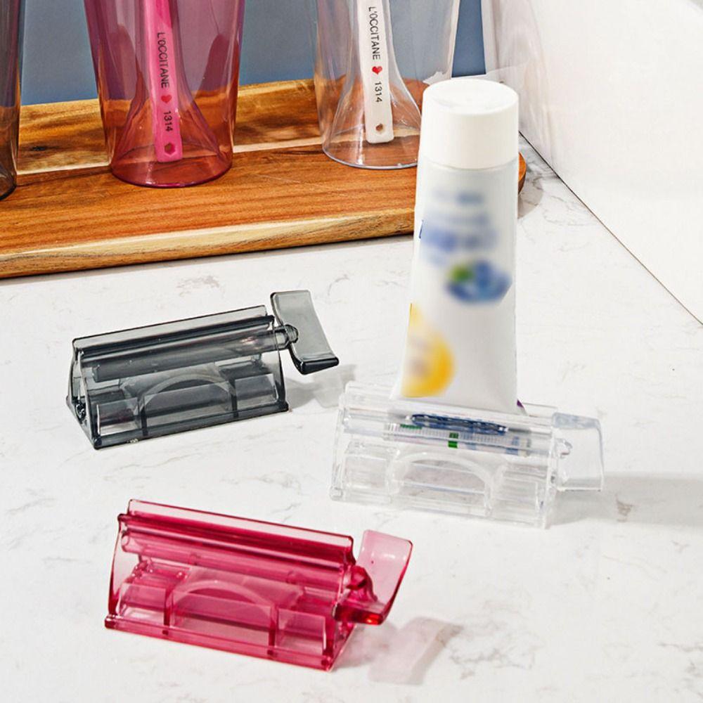 Seat Holder Toothpaste Rolling Tube Rotate Dispenser Portable Squeezer Household