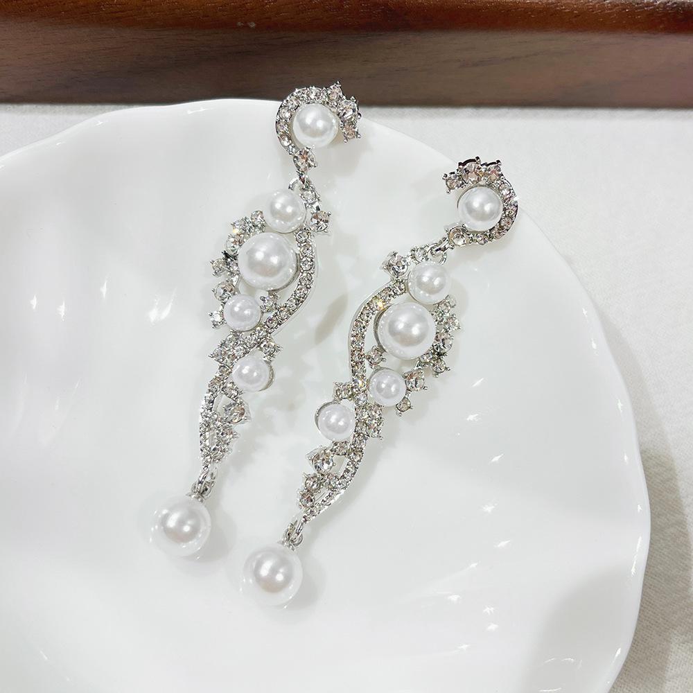 

Элегантные серьги-пусеты с жемчугом и цирконом для женщин - Ретро Роскошные Заметные Ювелирные Изделия серебряный