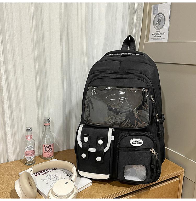 

Новый высококачественный студенческий рюкзак, повседневный и простой для учеников средней школы, легкий для поездок на работу, универсальный и вместительный рюкзак. чёрный