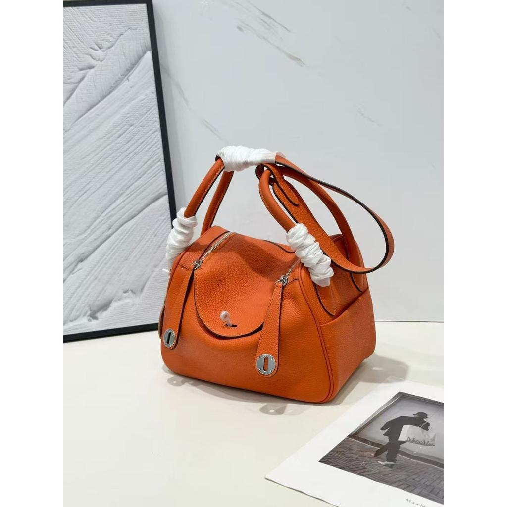 New leather pillow bag women's bag one-shoulder hand-held fashionable and versatile temperament mature woman bag