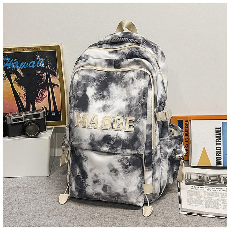 Der neue Schulranzen ist hochwertig, frisch und süß, ein Rucksack mit literarischem Graffiti-Tie-Dye und ein leichter Rucksack für Junior- und Oberstufenschüler.