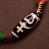 Adjustable Tibetan Handcrafted Dzi Bead Bracelet with Auspicious Hand-Rubbed Cotton Cord