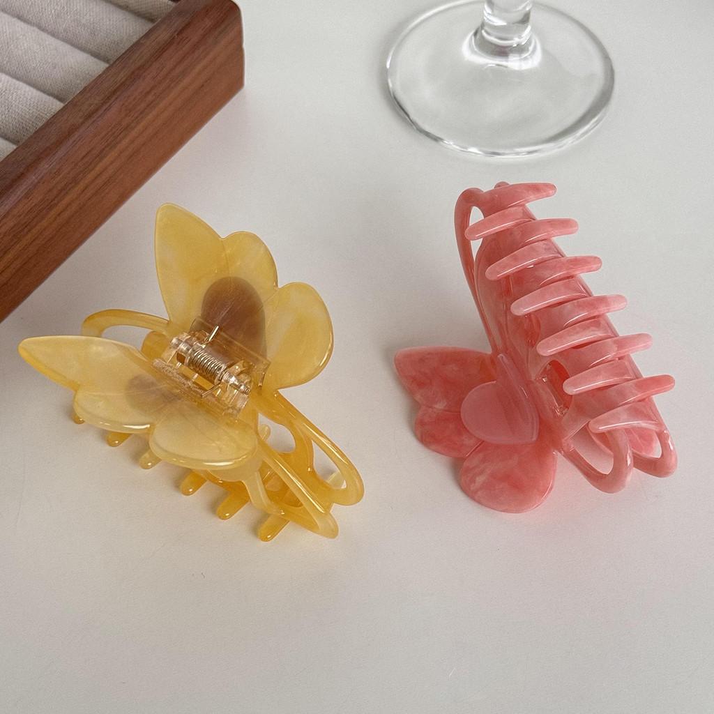 Dorei Accessories Snygg Hårklämma i Acetat med Hjärta och Fjäril för Eleganta Uppläggningar