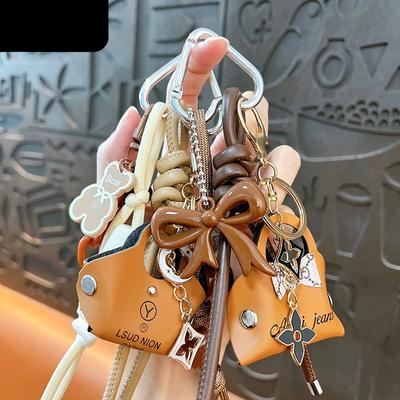 Grenzüberschreitende Wickeltasche Anhänger Mini-Tasche Schlüsselanhänger Anhänger PU Auto-Anhänger Taschenzubehör High-End Kleine Geschenke