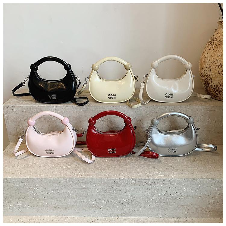 Super fire niche dumpling bag 2025 new spring and summer versatile shoulder messenger bag exquisite mini portable small bag