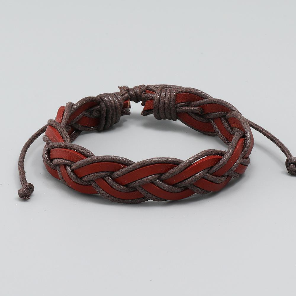 Nytt enkelt håndvevd armbånd kors kuskinnarmbånd kreativt personlig retro armbånd