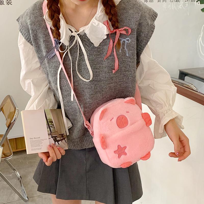 2025 new small bag autumn and winter cute cartoon plush mobile phone bag walking oblique span bag