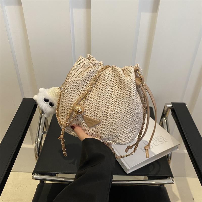 Drawstring fashion Korean version casual bag 2025 spring and summer new foreign style shoulder messenger bag straw bucket bag women's bag tide
