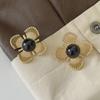 Elegant Retro French Light Luxury Hollow Four-Leaf Flower Earrings for Women