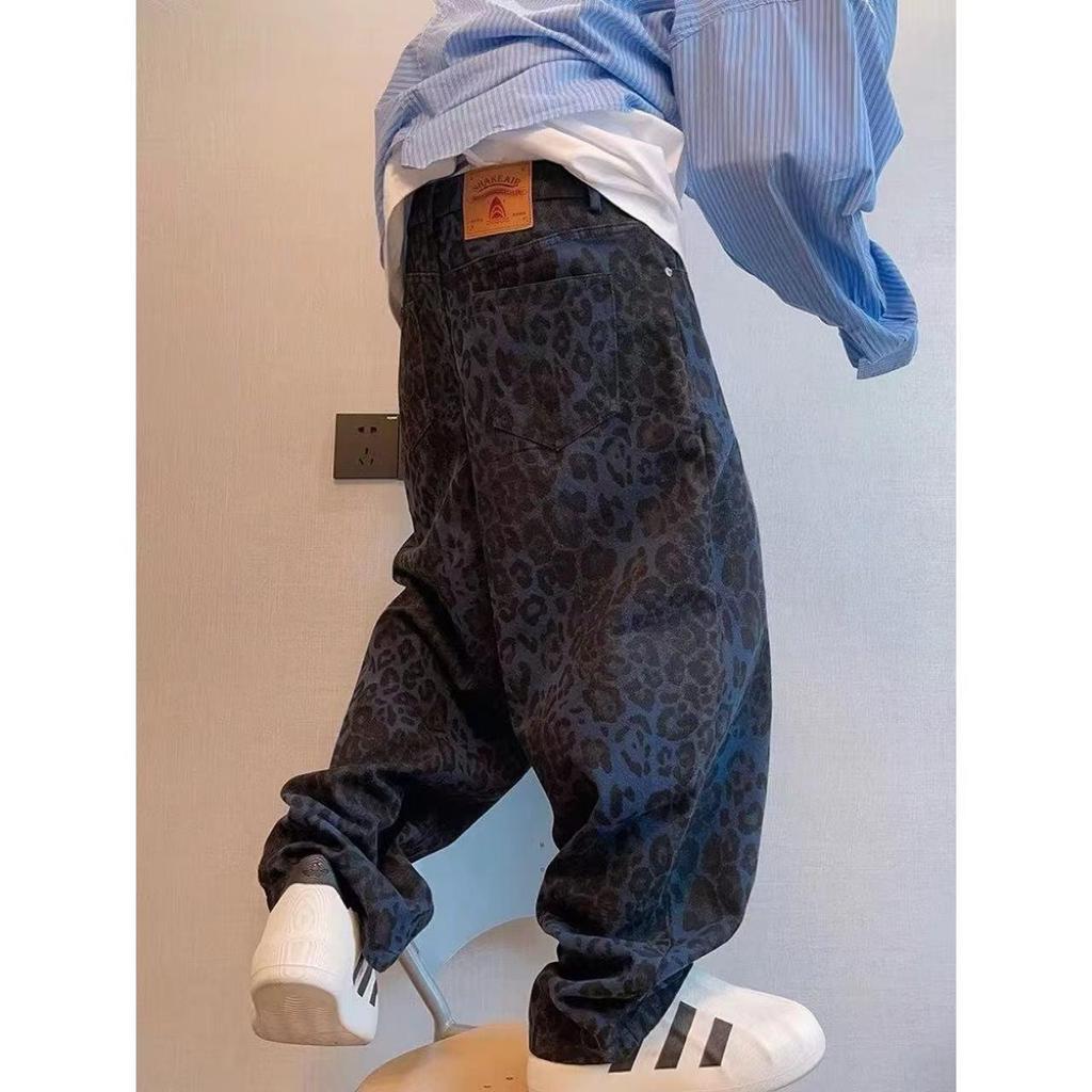 Americká vysoká pouliční móda: Pánské volné džíny s koženou výšivkou - Zimní trend, široký střih.