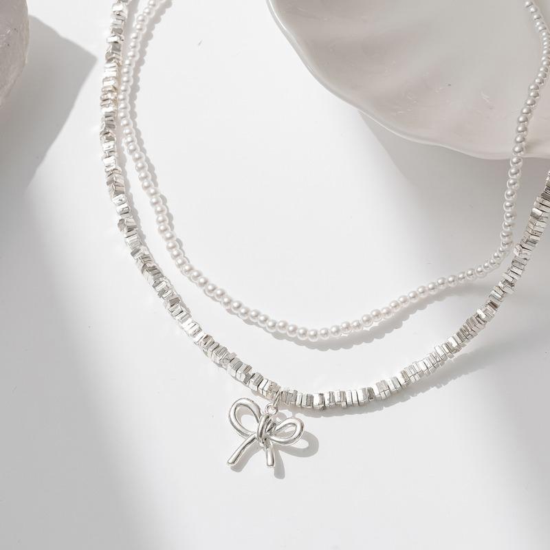New Bow Necklace Women's Simple and High-end Retro Double-layered Design Imitation Pearl Collarbone Chain