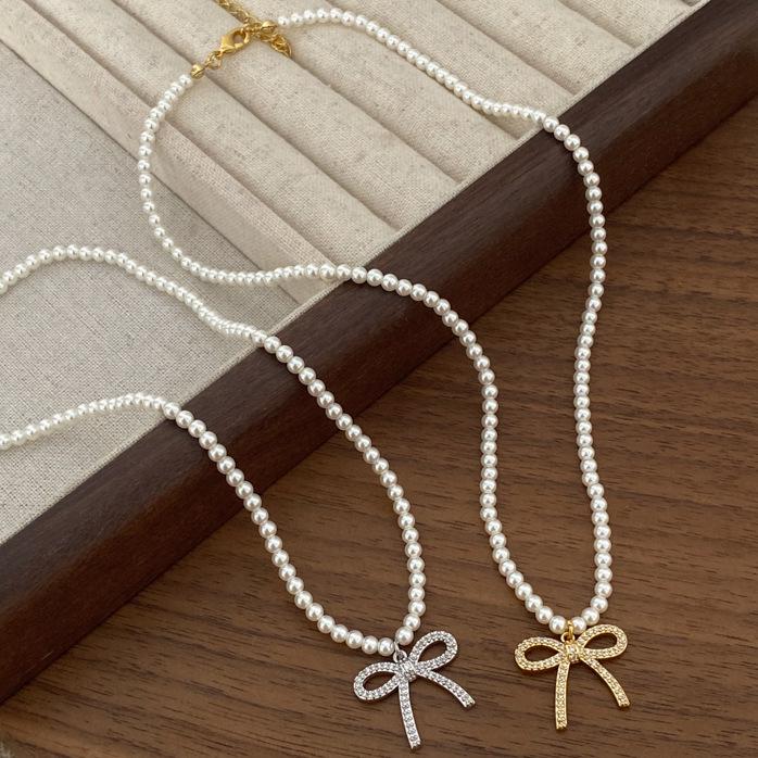 

2024 New Korean Dongdaemun Style Bow Necklace with Cubic Zirconia & Pearls