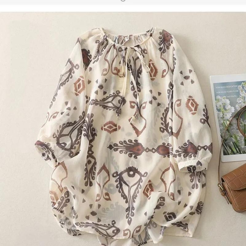

beige ethnic print tie neck three quarter sleeve chiffon blouse for women s
