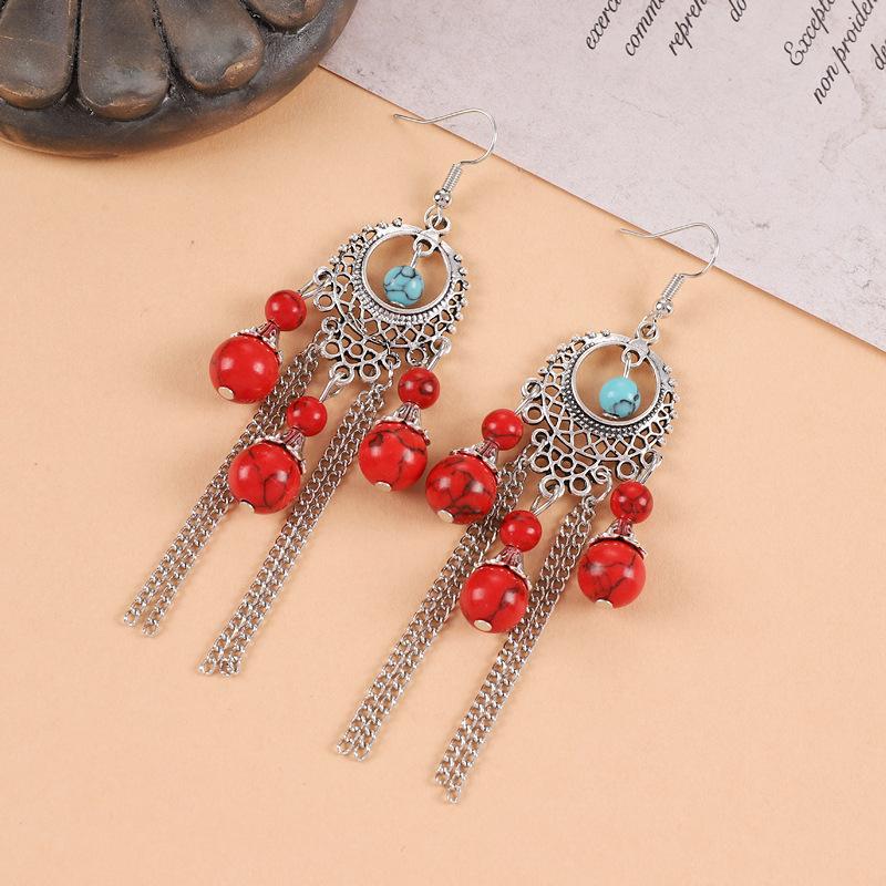 Turquoise fringed earrings women's exotic Tibetan long retro personalized earrings Chinese antique earrings
