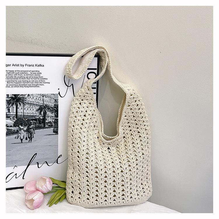 

Spring hollow woven bag women s new vacation beach bag commuter shoulder tote bag knitted bag off білий колір