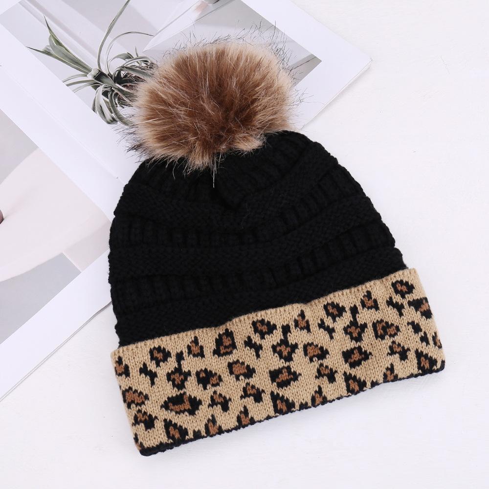 European and American fashion leopard print hairball decoration niche versatile knitted hat autumn and winter travel windproof warm wool hat