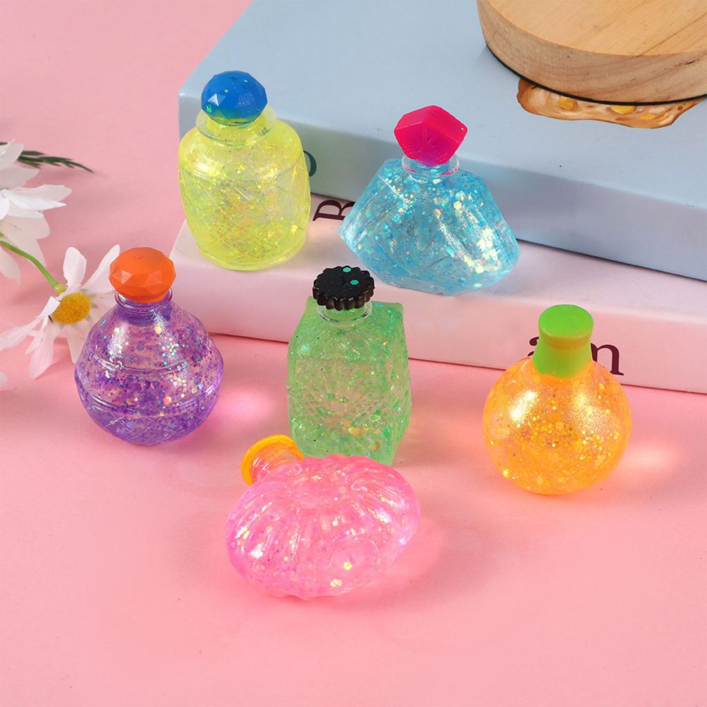 Funkelnde Langsame Parfümflasche Malz-Prise Musik Entlüftungsspielzeug Parfümflasche Druckentlastungskugel