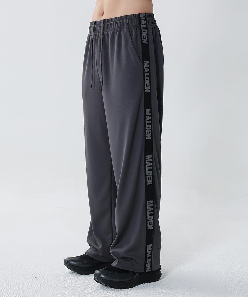 Moldeun Mesh Lettering Track Pants