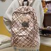 Schoolbag wholesale high school student campus backpack female ins wind small fresh plaid load reduction spine bag commuter backpack