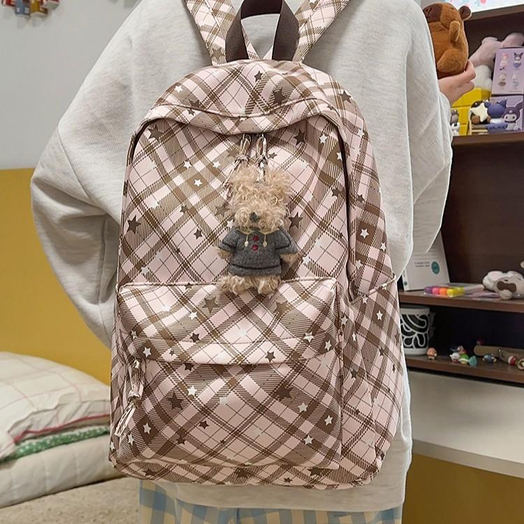 Schoolbag wholesale high school student campus backpack female ins wind small fresh plaid load reduction spine bag commuter backpack